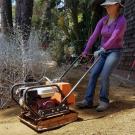 Photo of person conducting path repairs.